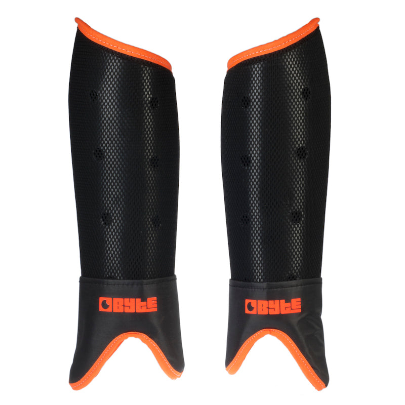 Byte SX Field Hockey Shin Guards in Black Fluo Orange